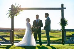 Waterfront ceremony - Couple exchanging vows