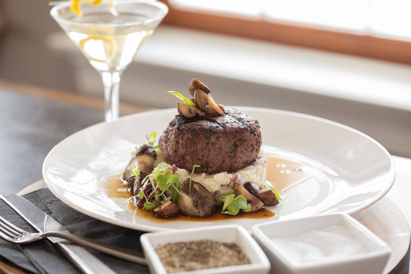 Filet Mignon Plate of Filet Mignon over a bed of mashed potatoes and a mushroom reduction