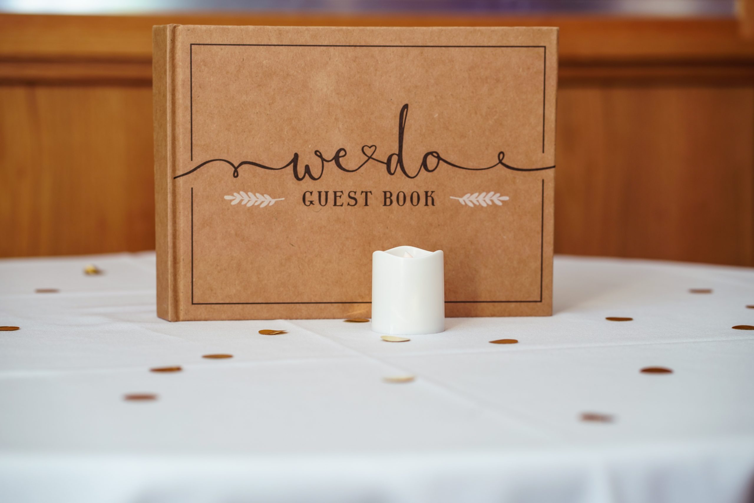 Wedding Guest Book Brown wedding guest book on table